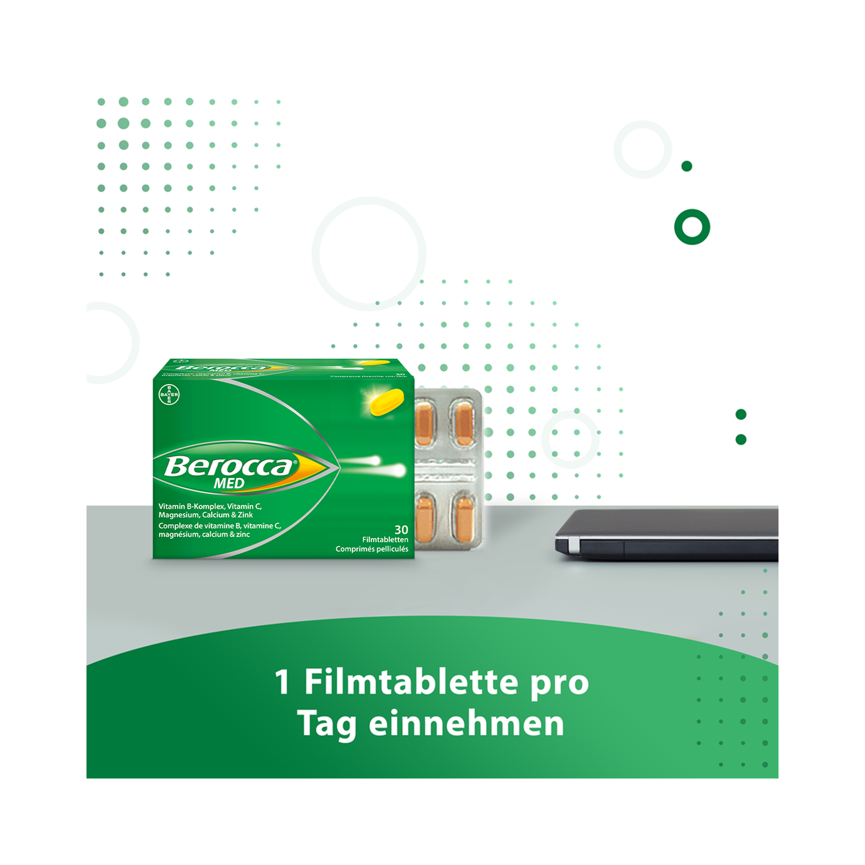 Berocca Filmtabletten Packshot mit sichtbaren Tabletten neben einem Laptop. Titel: 1 Filmtablette pro Tag einnehmen 